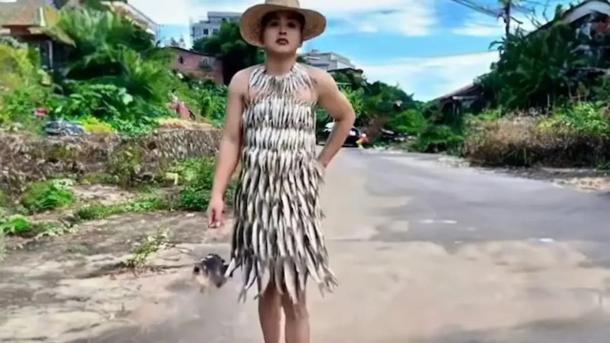 model wearing fish dress ent