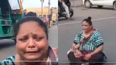 Vadodara witnessed a bizarre protest when a woman sat in the middle of a busy road