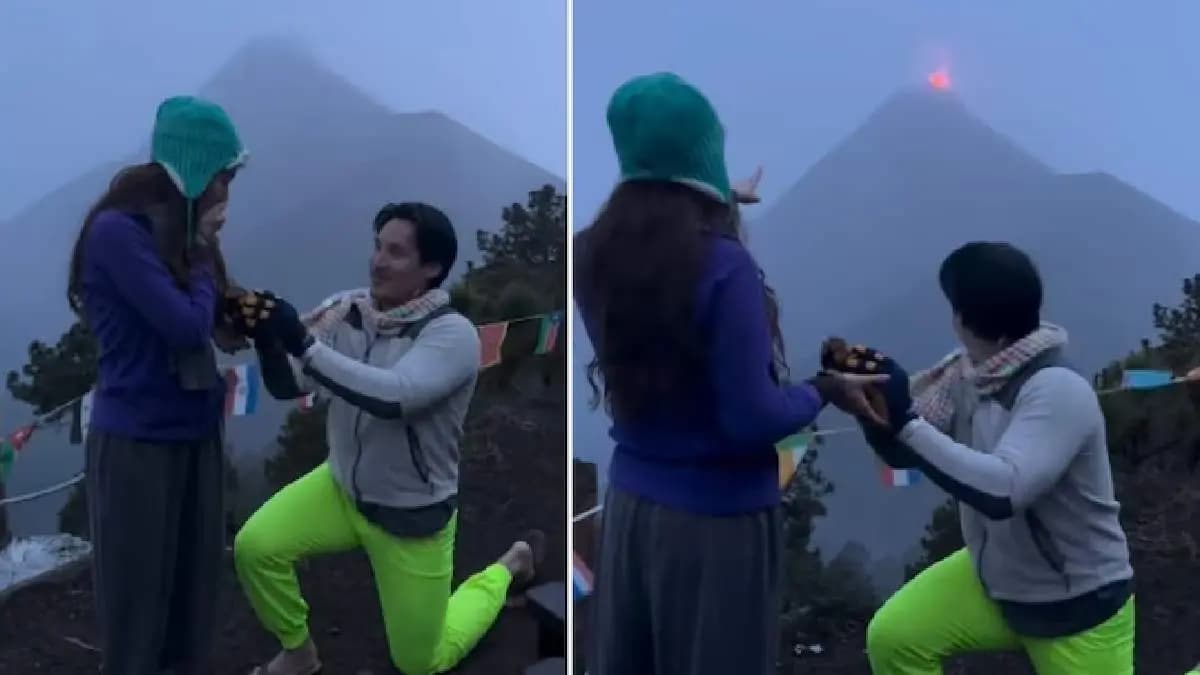 Volcano erupts moments after woman says yes to boyfriend proposal in video
