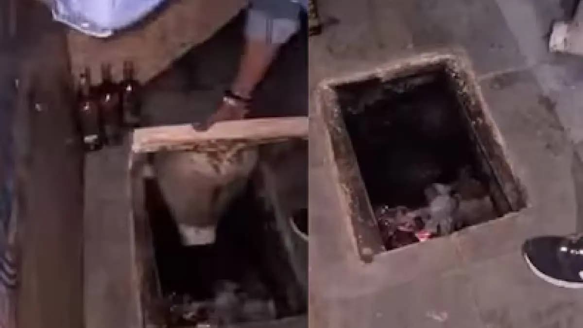 Ahmedabads Bar-throom As Police Dug Up Eight Hundred Liquor Bottles From Toilet