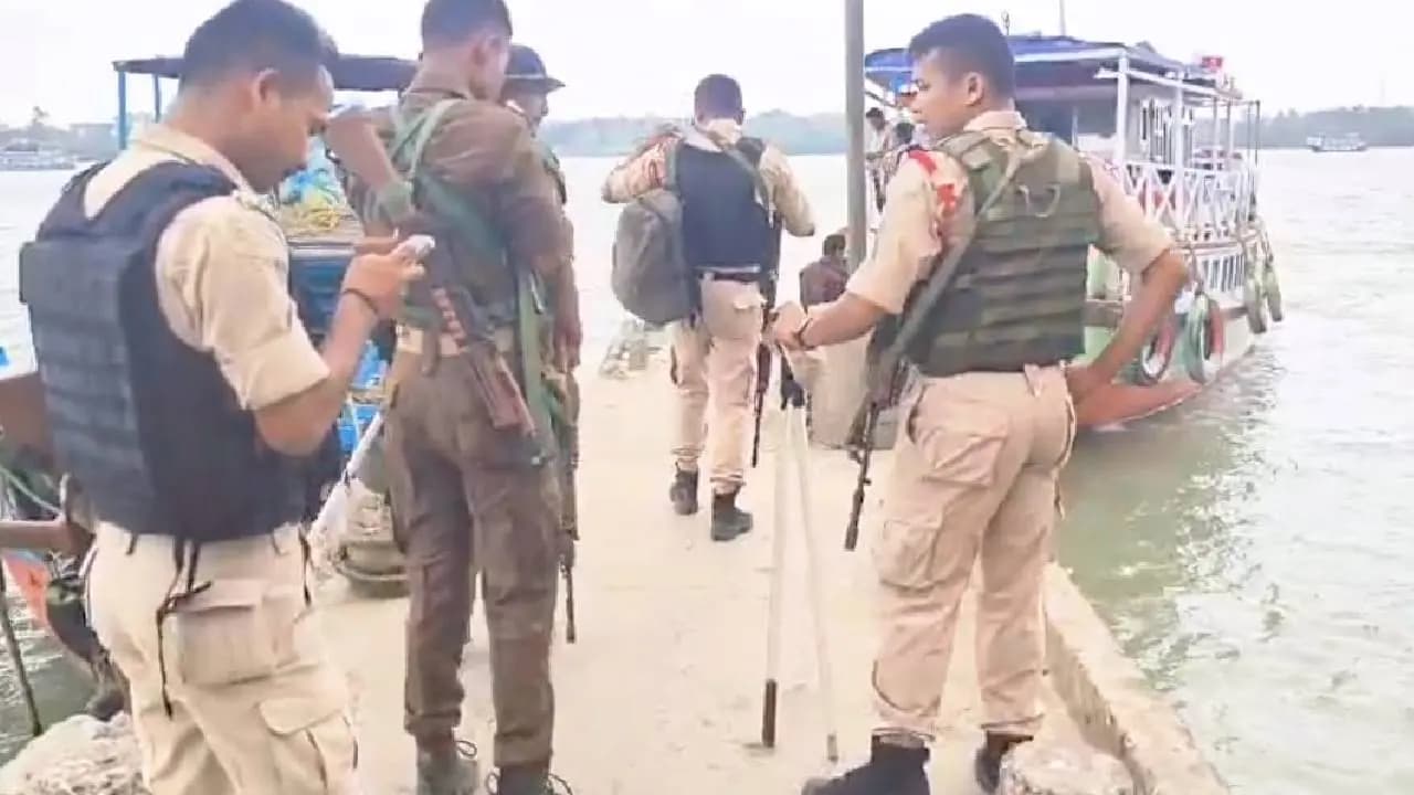 Officers Reach Polling Station By Boat In Patharpratima in West Bengal 