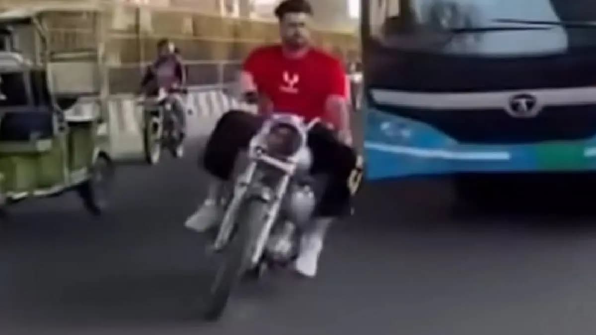 Young Biker Gets Trapped While Trying To Show Off His Skills
