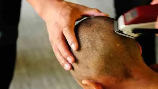 Over Inter Caste Marriage 40 Members of a Family Had To Shave Heads in Odisha