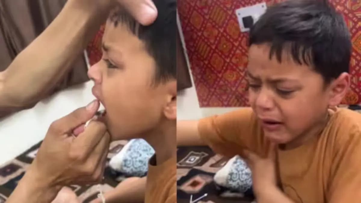 Father Pulls Tooth Using Thread son crying loudly viral video