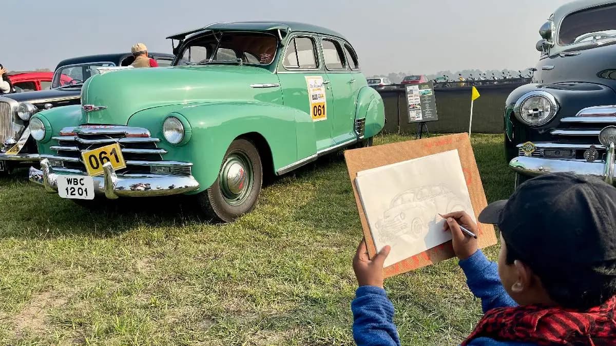 class seven student drawing pictures of cars wants to do work about car model in future do you know this thirteen-year-old Saptak?