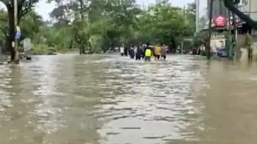Car Gets Swept Away In Flooded Causeway