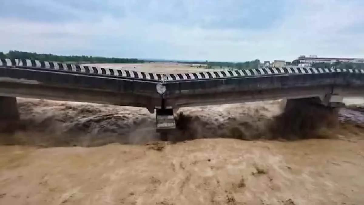IMD Weather Update Heavy rains pound Jammu and Kashmir as key bridge collapses