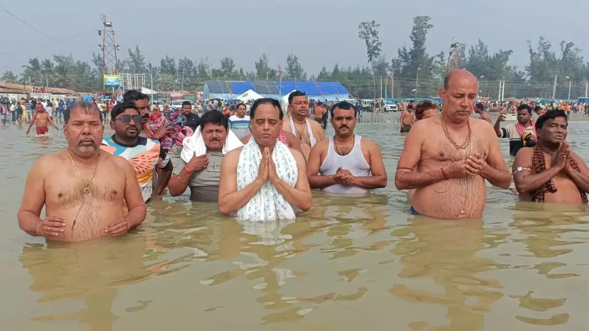 Gangasagar mela2025 aroop bishwas sukanta majumdar took holy dip at gangasagar