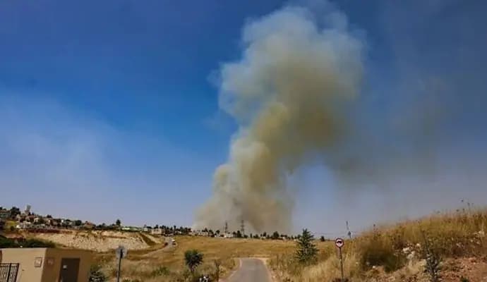 Hezbollah fires 200 rockets at Israel after senior commander killed