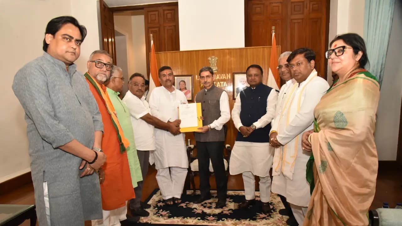 Suvendu Adhikari and other BJP leadership met with governor R N Ravi and formally stakes claim to form government