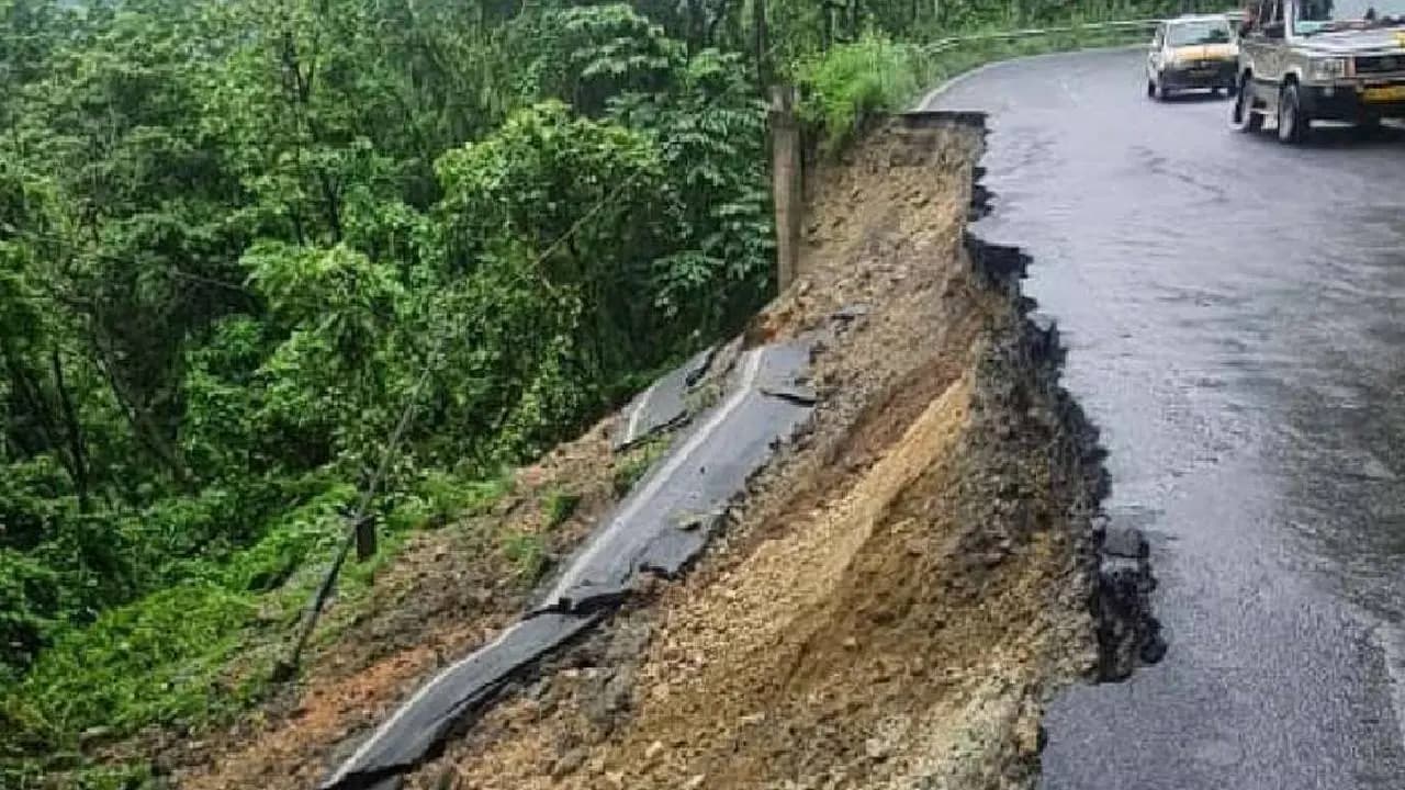 Landslide Alert massive amount of soil and rock suddenly collapsed from hillside onto National Highway 10 in the Baghpul area Sevoke Kali Temple