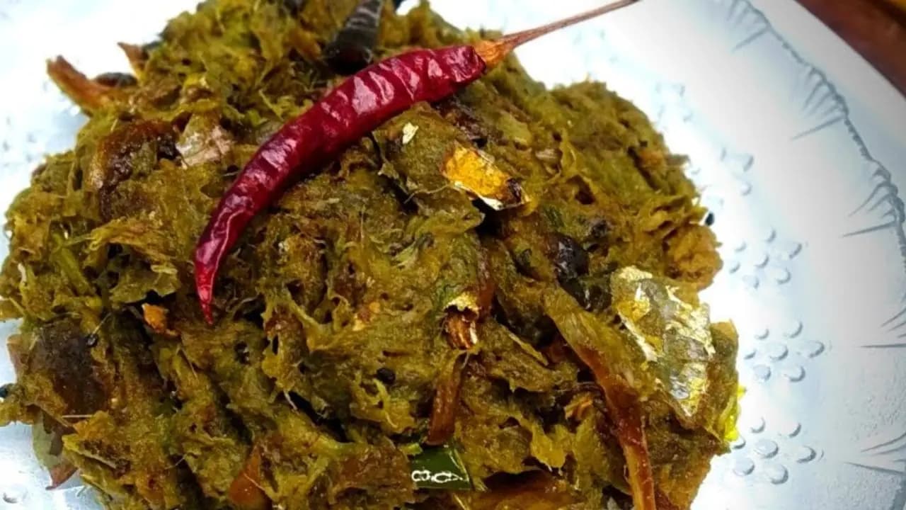 kochur shak ilish macher matha diye 
