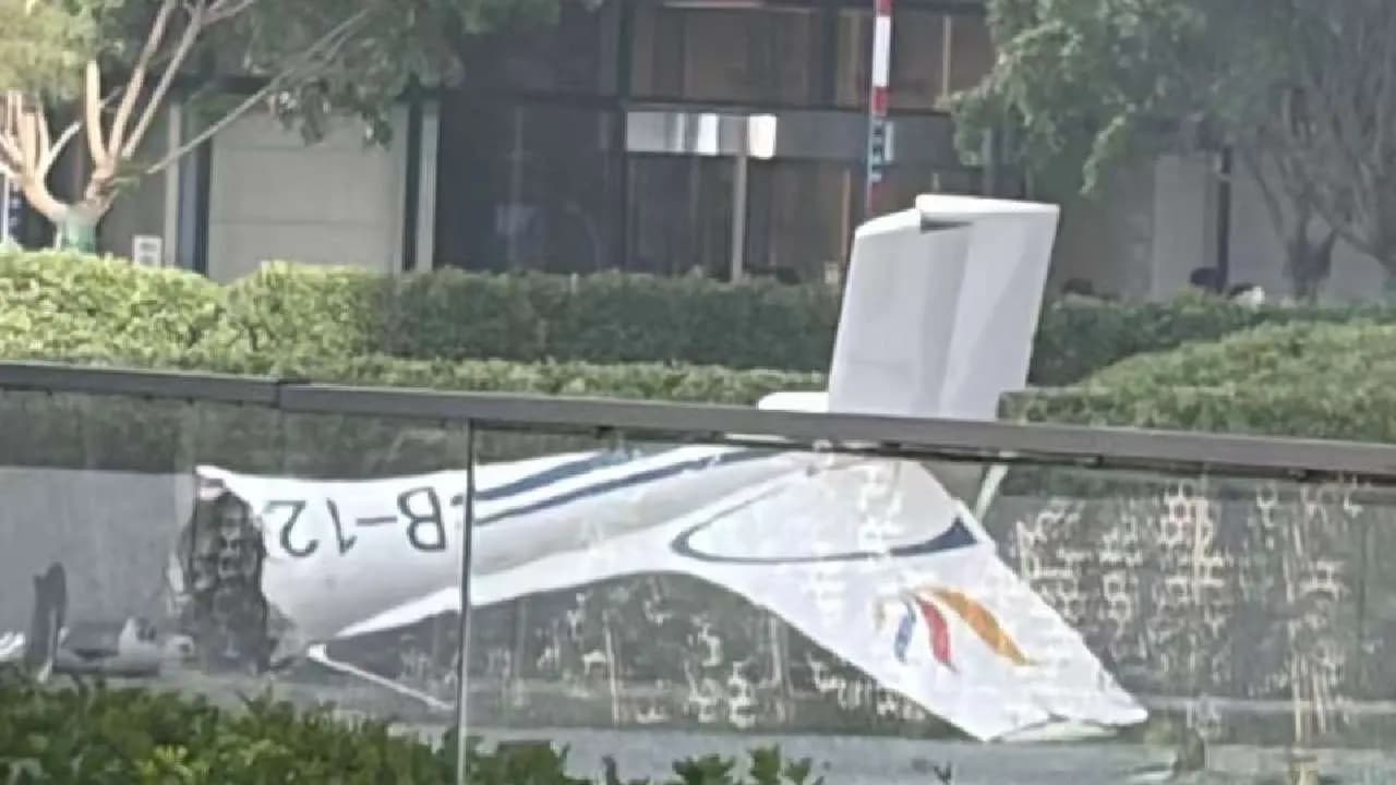 Plane Crashes Into Beijing s Tallest Building Debris Falls From Sky