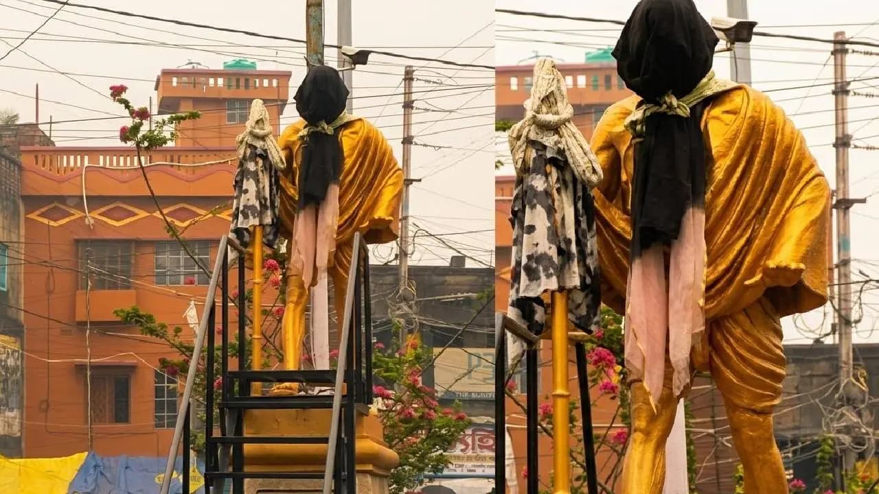 Gandhi statue in Katwa covered with black cloth BJP leader expresses outrage, while residents perform purification rituals and offer prayers