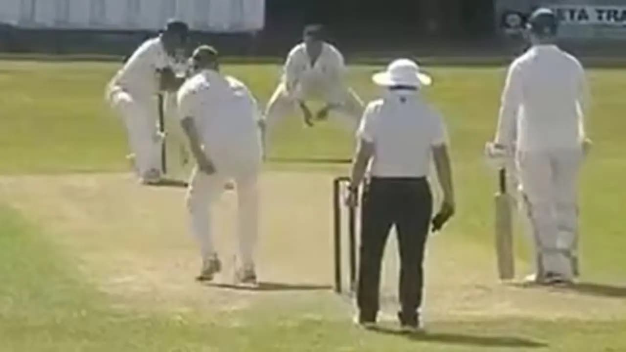 Fielder clicks his finger and  umpire gives batter out in England Club Cricket