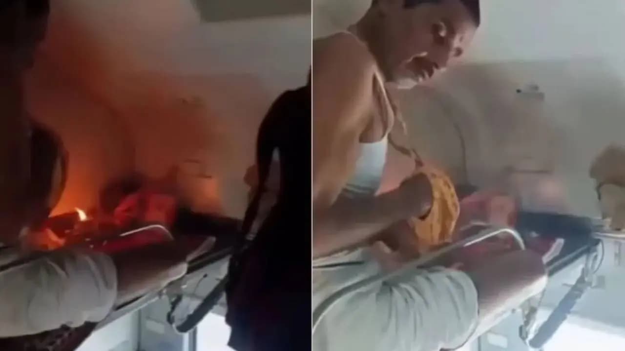 man performing puja inside a running train