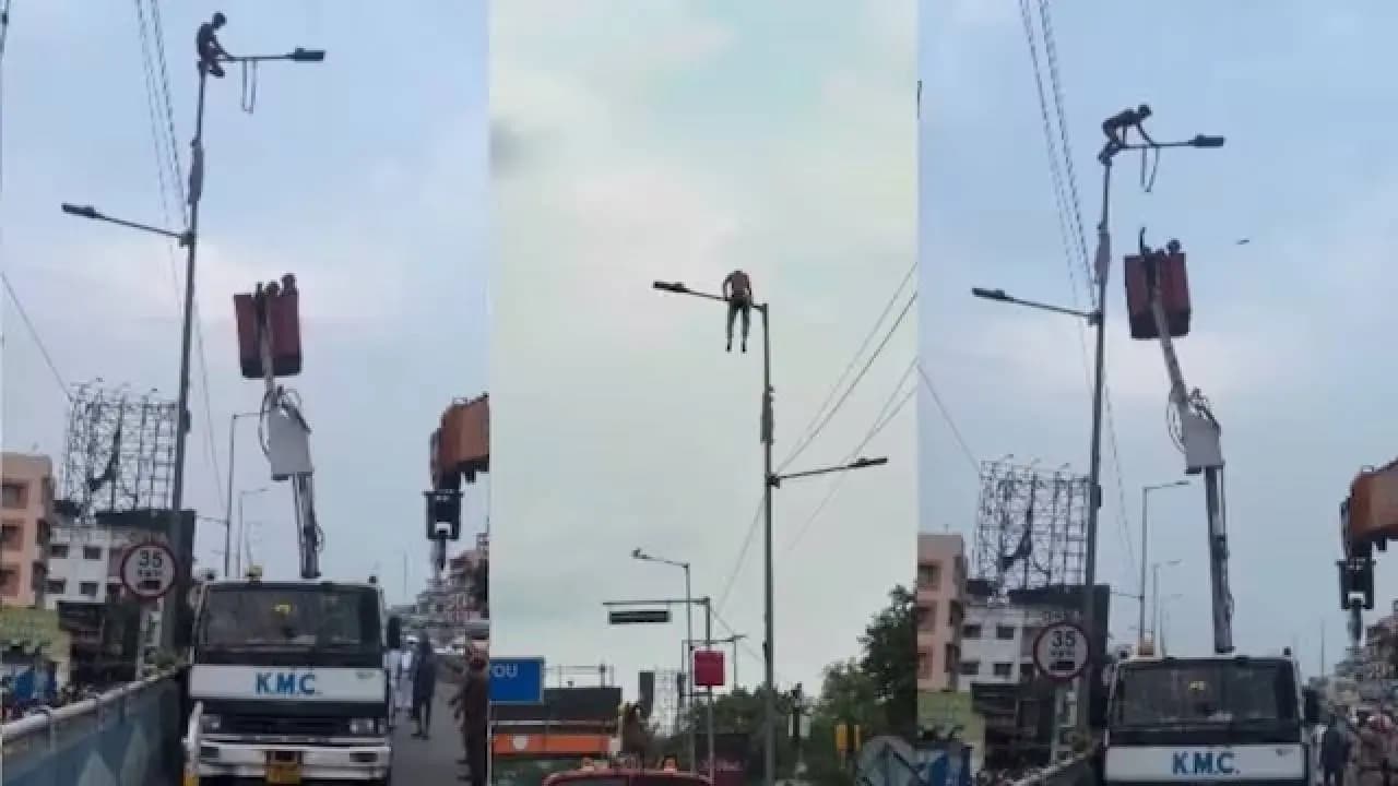 Boyfriend Climbs Streetlight Pole Over Unanswered Calls Rescued Via Hydraulic Crane