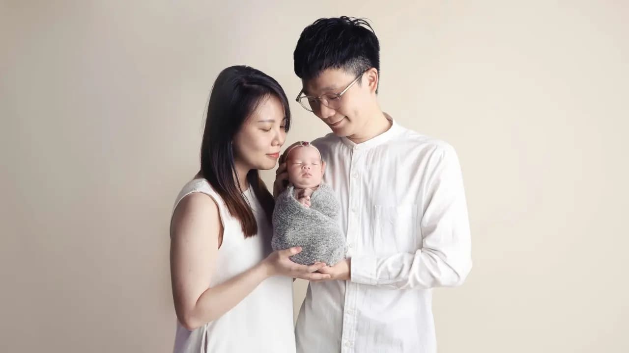 Singapore 55000 dollar per child birth rate boost family support