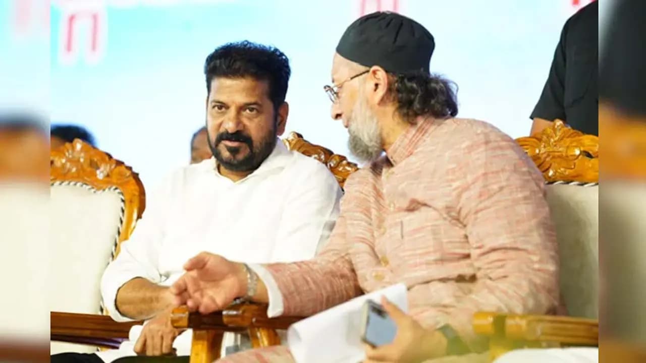  Wrestling in Delhi friendship in Telangana are Congresss Revanth Reddy and Owaisi cozying up to each other sensing the future 