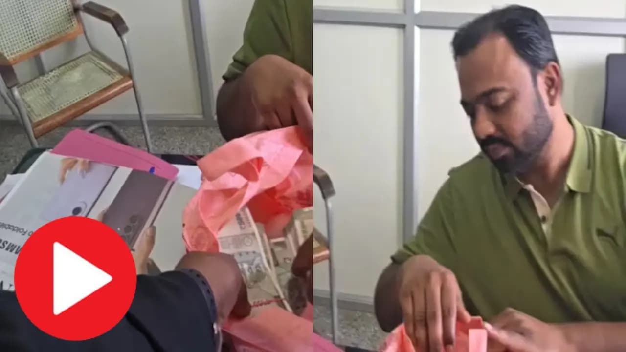 A central GST officer was caught red-handed by Lokayukta officials while taking bribe in Bengaluru