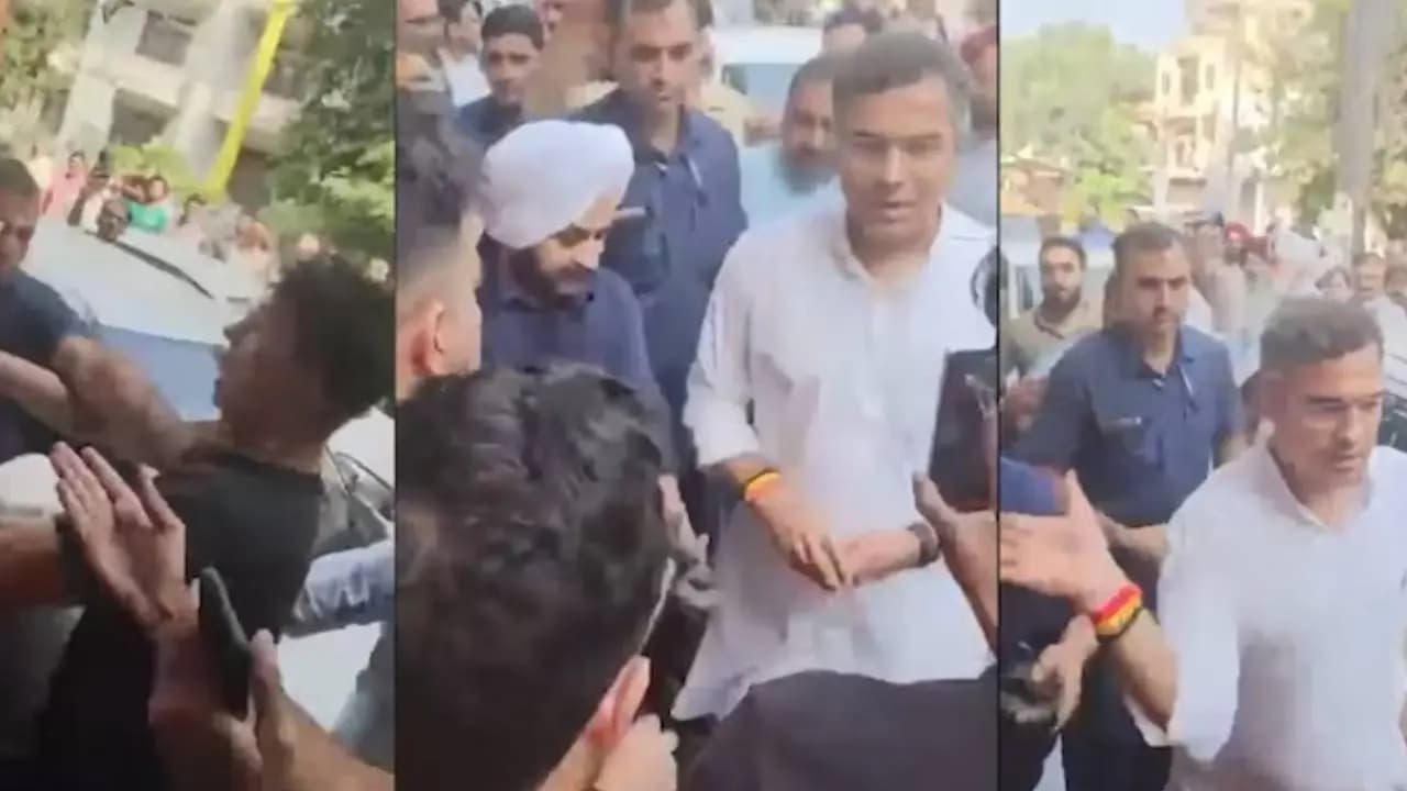 Commotion during road inspection Delhi minister delivers slap as a young man records a video