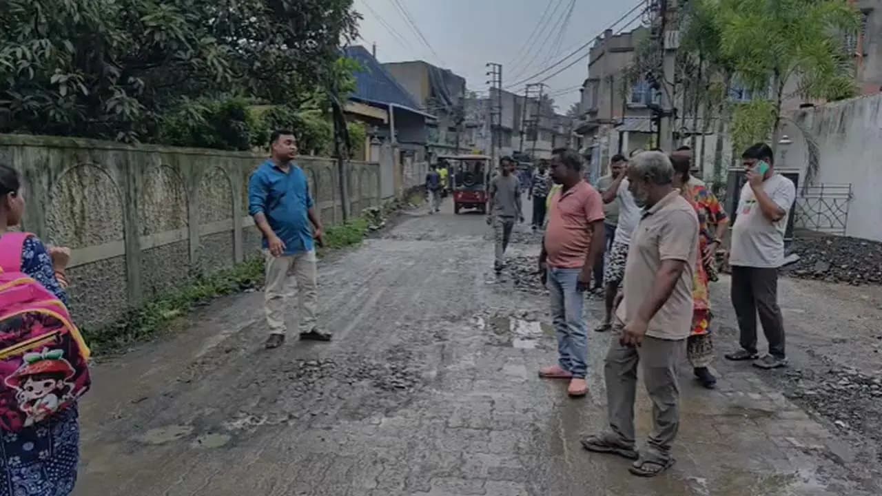 The asphalt surface of the Noiti Road stretching from Konnagar to Pardankuni has peeled off due to the rain The BJP alleges a conspiracy