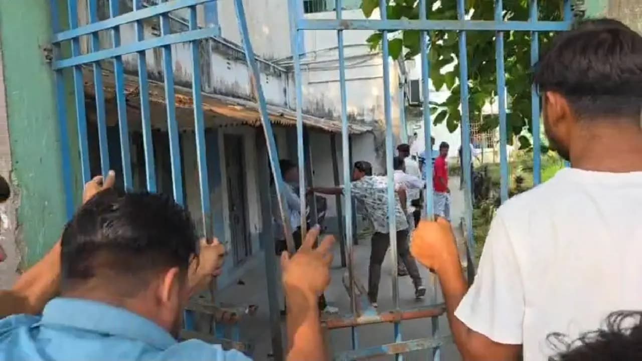ABVP Alleges SFI Supporters Broke Raiganj University Main Gate
