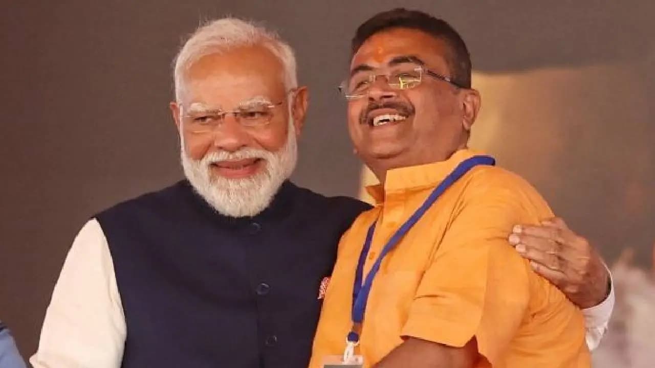Modis 25 Years in Politics Suvendu Heads to Gujarat Cancels North Bengal Trip
