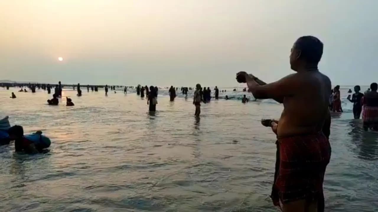 On the auspicious occasion of Mahalaya holy bathing and tarpan offerings to ancestors have begun at Gangasagar Beach since the early morning