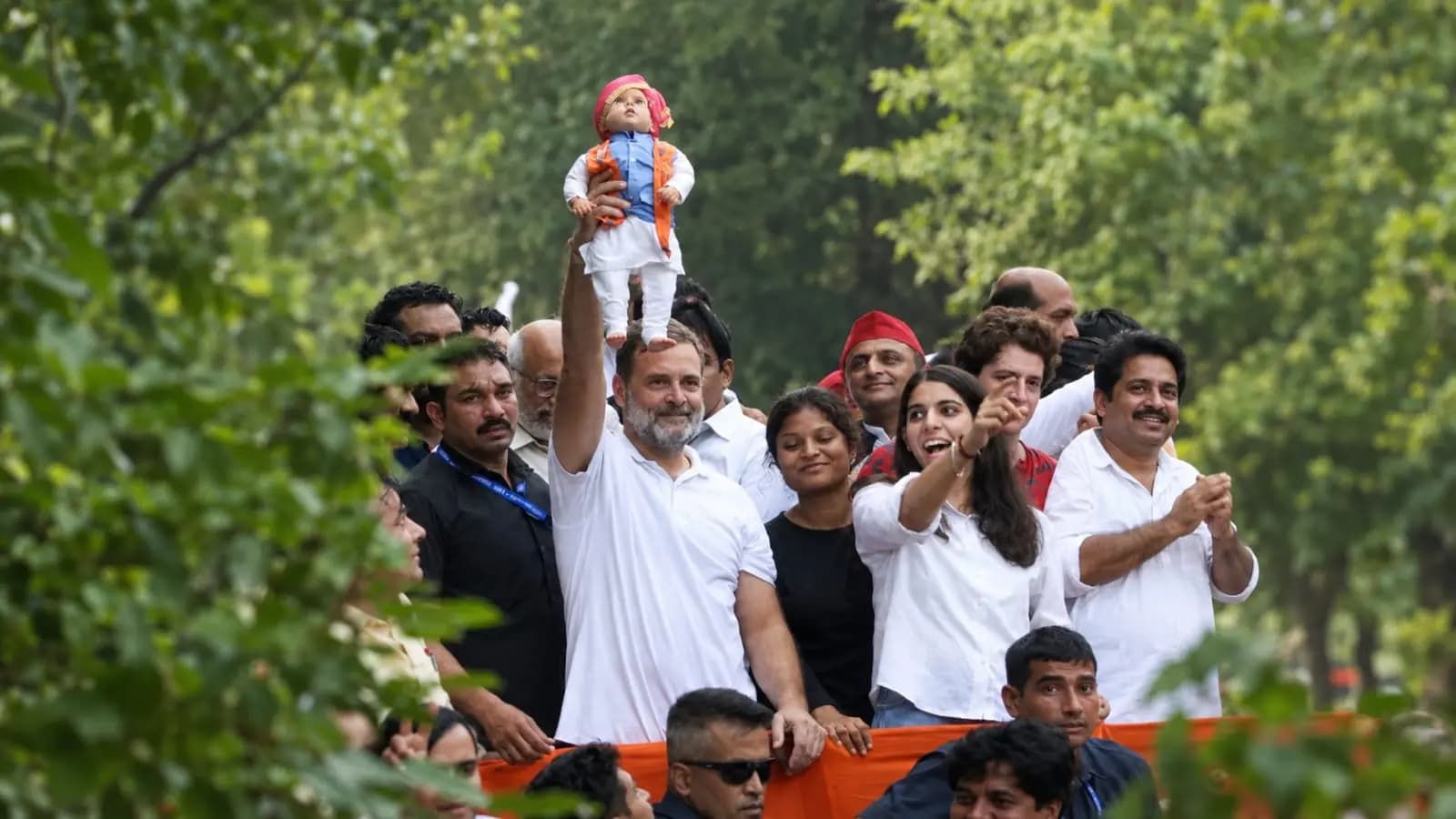 Kharge Wears Batman Mask Rahul Holds Modi Idol