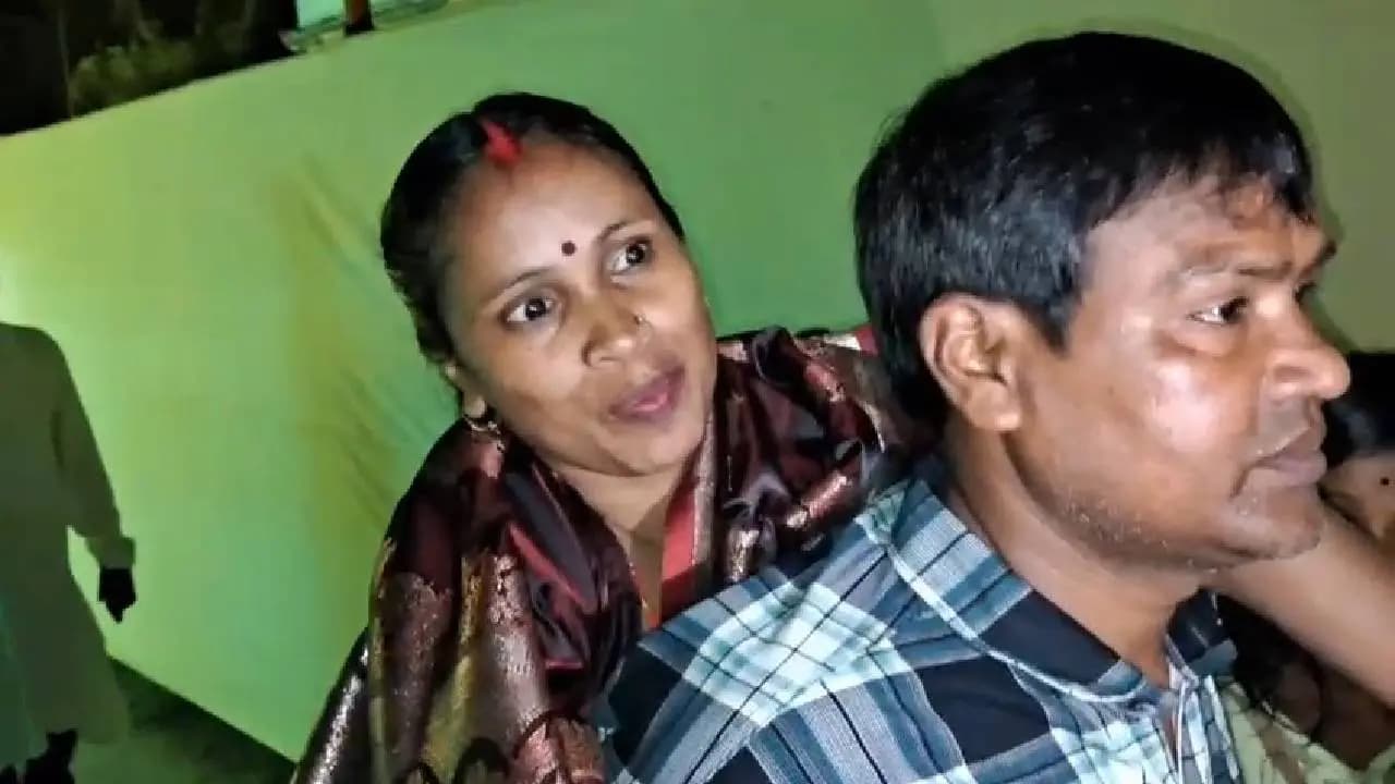 Husband Carries Specially Abled Wife on his back for Pandel Hopping during Durga Puja