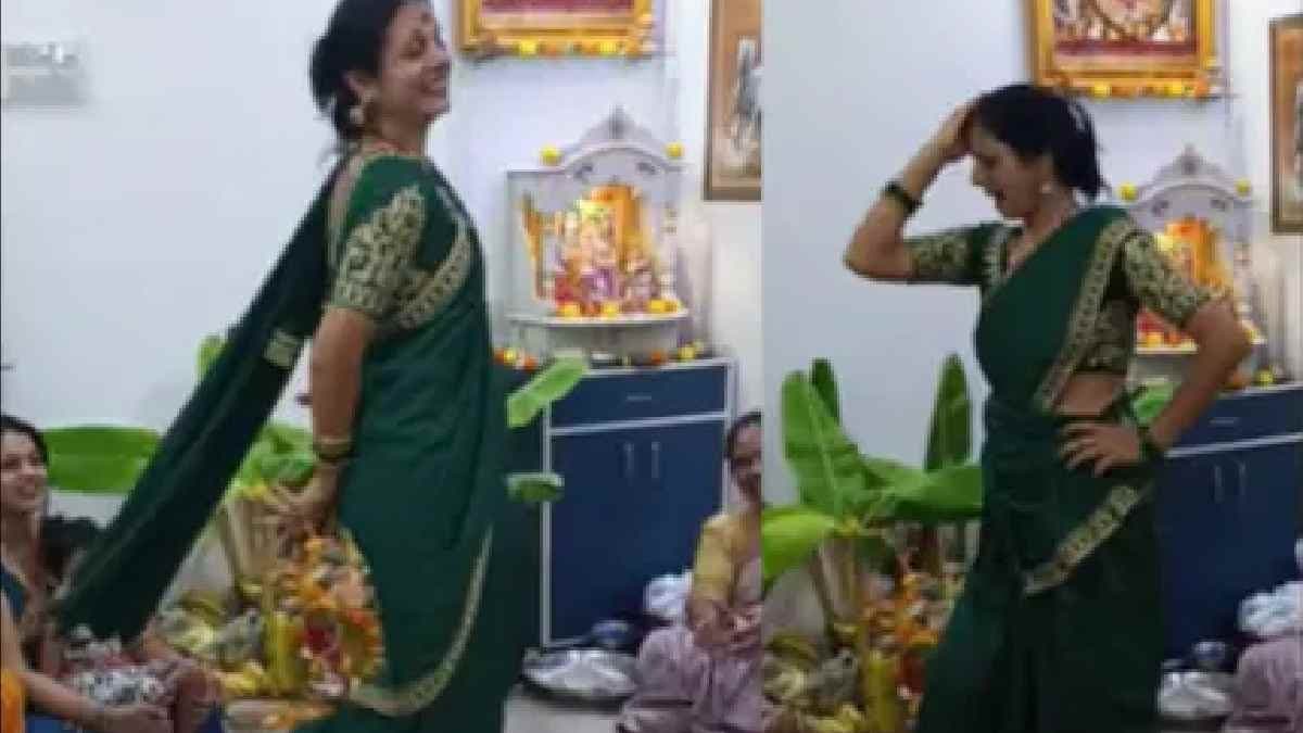 woman dancing during Satyanarayana Puja at home
