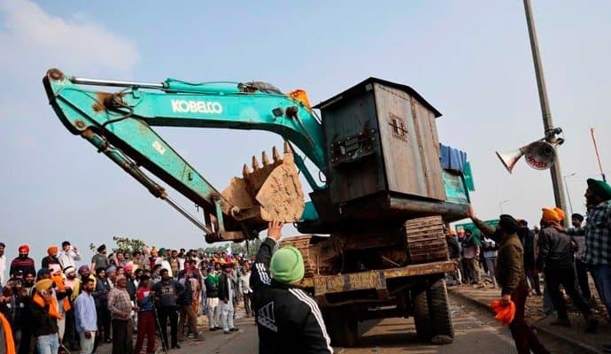 Tear Gas Fired As Farmers Prepare To Resume Delhi March