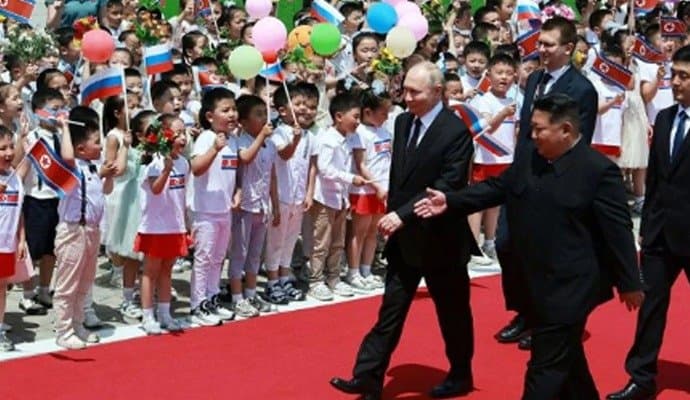 Vladimir Putin meets Kim Jong Un in first visit to North Korea in 24 years