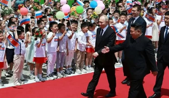 Vladimir Putin meets Kim Jong Un in first visit to North Korea in 24 years