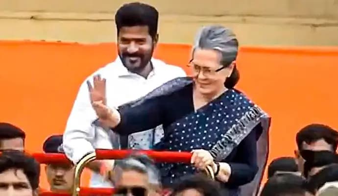 Revanth Reddy Arriving For Oath With Sonia Gandhi