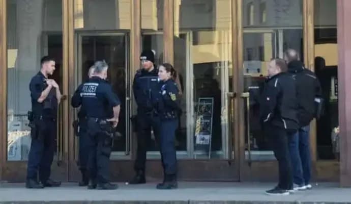 knife attack at university of germany, accused shot dead