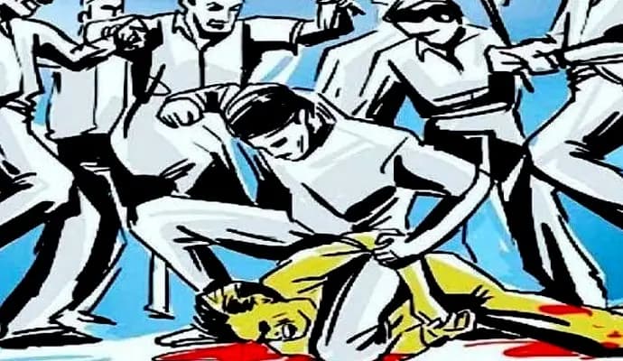 group of people beat man in canning