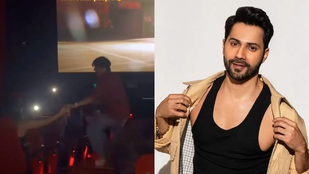 Varun Dhawan Reacts as couple s romantic dance to palat inside cinema hall goes viral