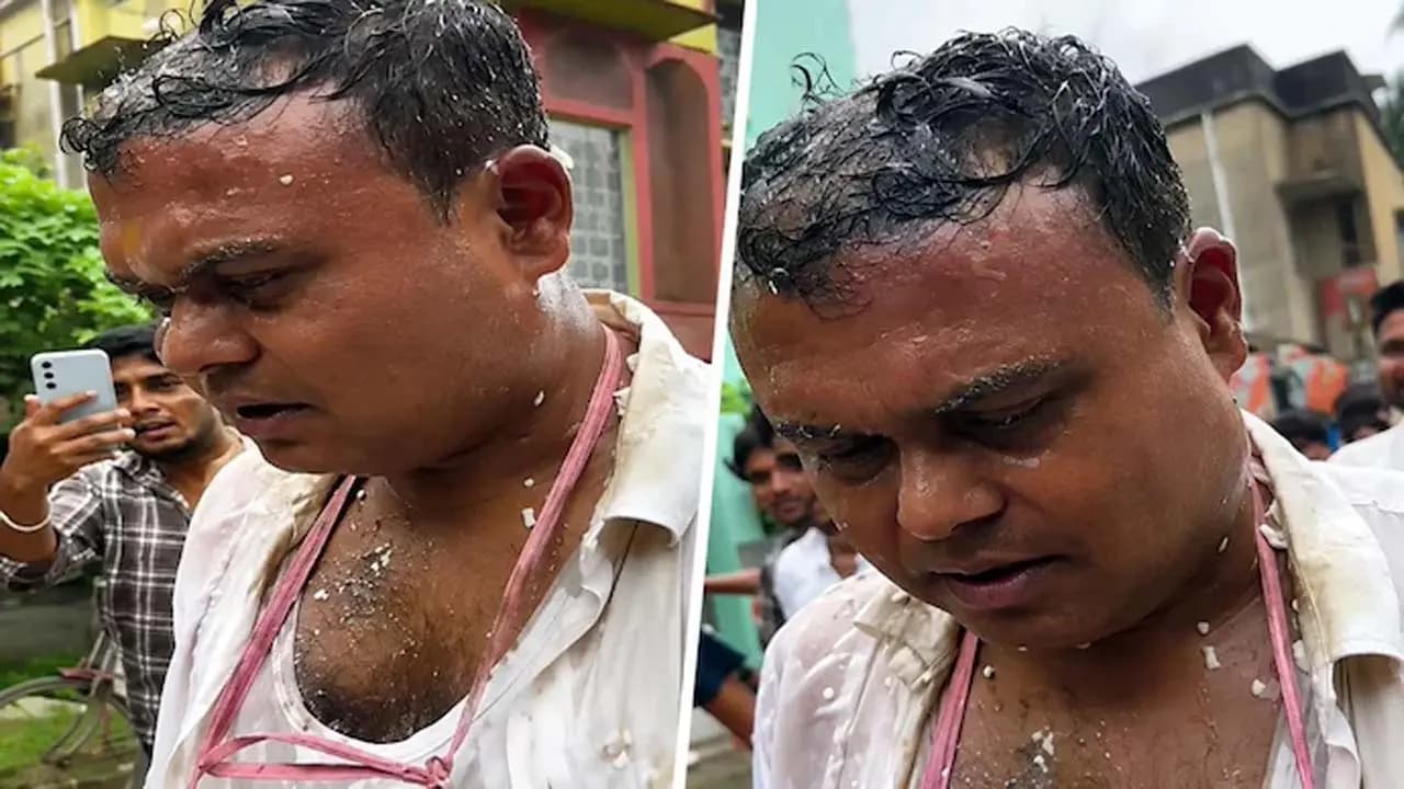 A professor accused of making indecent proposals to a female student was beaten with a broom pelted with eggs and paraded around the campus wearing a garland of shoes